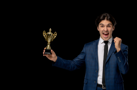 business-man-cute-excited-man-dark-blue-suit-with-tie-holding-trophy
